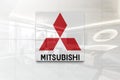 Mitsubishi on glossy office wall realistic texture